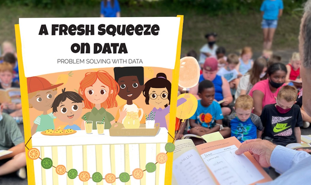 児童書『A Fresh Squeeze on Data』を読む子供たち